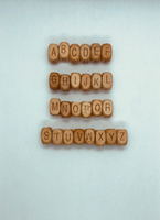 Perles lettre en bois de hêtre 12mm
